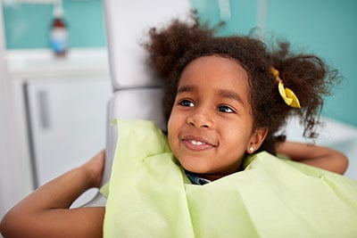 smiling girl at the dentist