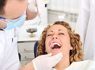 smiling woman at dental office